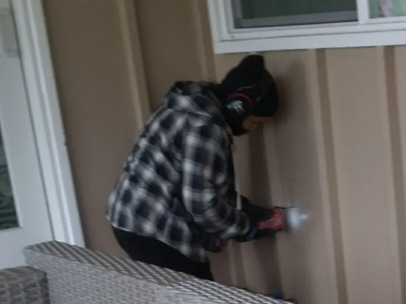 Professional electrician installing an exterior outlet in Granite Falls