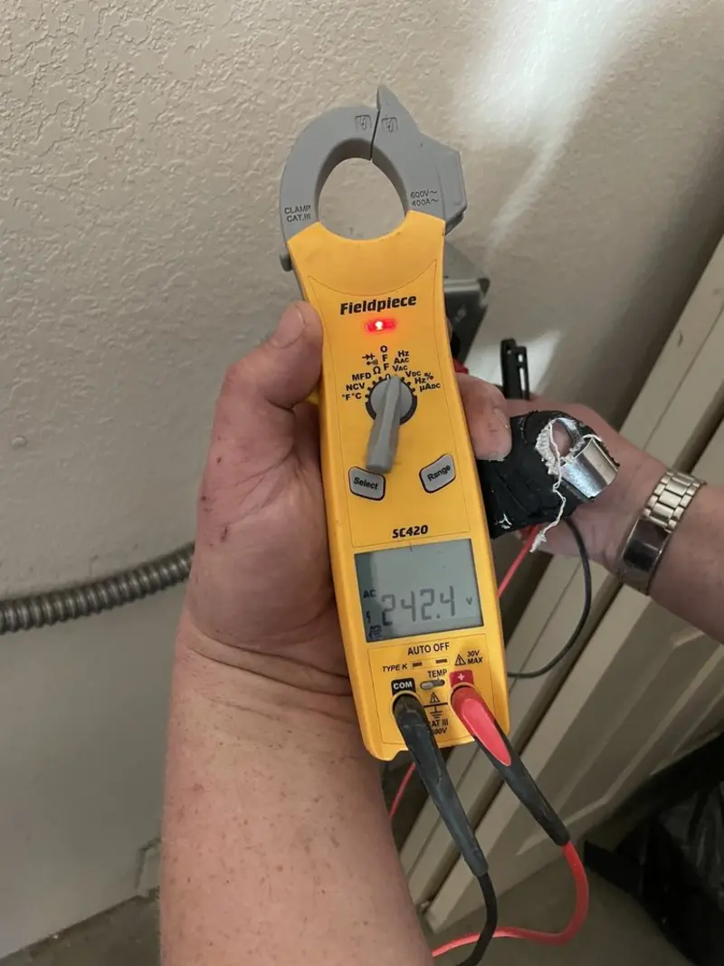 Voltage testing with clamp meter during Circuit Breaker Repair in Granite Falls